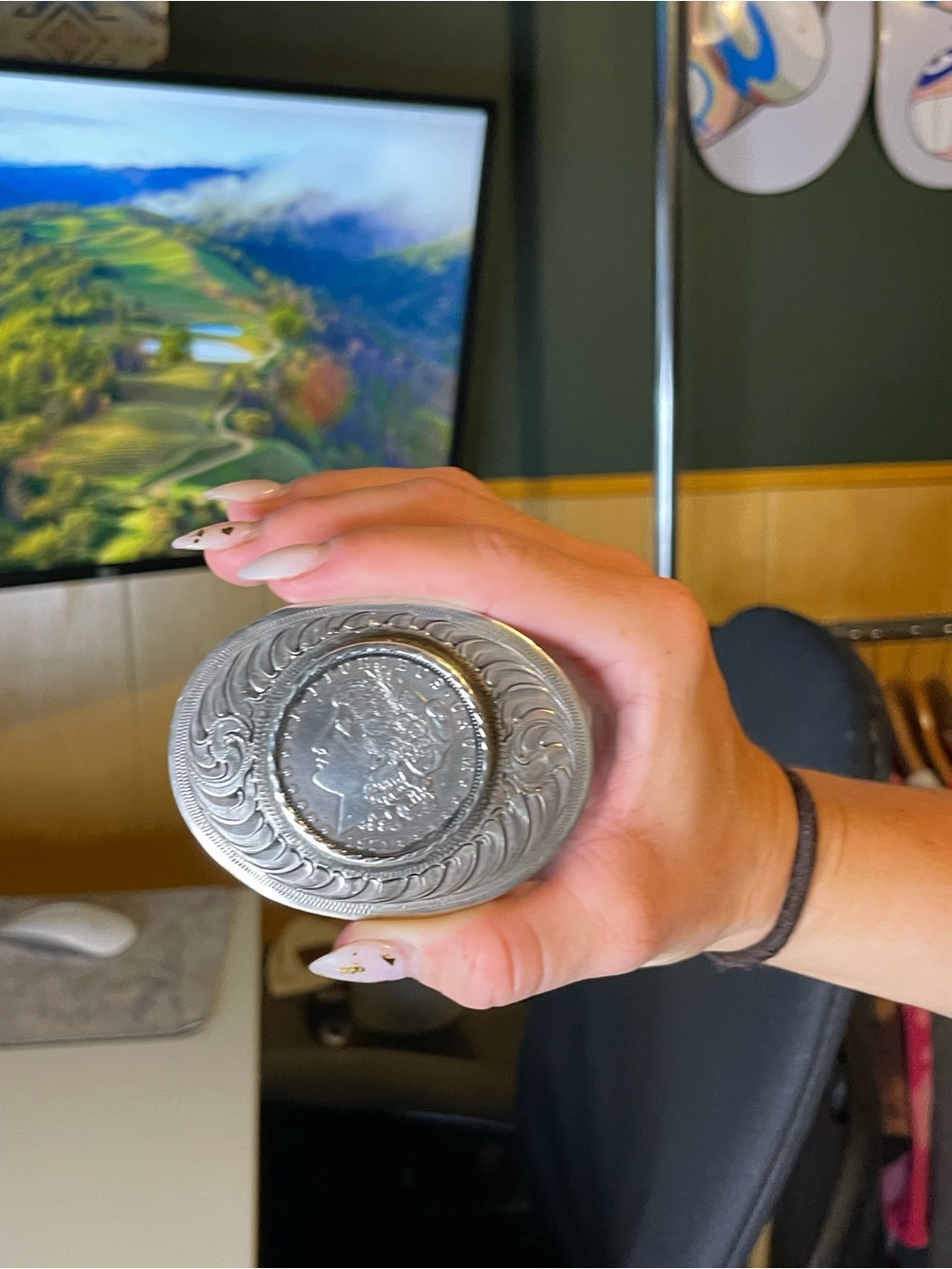Montana oval western belt buckle featuring a 1921 Morgan Silver Dollar